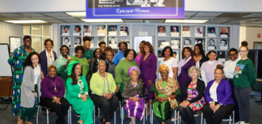 Female students, faculty and staff pose for International Women's Day